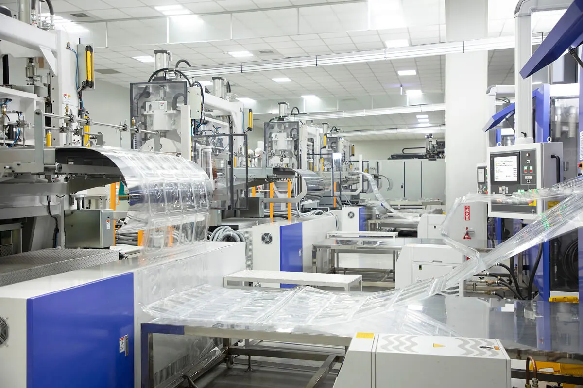 SPI thermoforming production line from a PPWR food packaging supplier producing rPET food containers