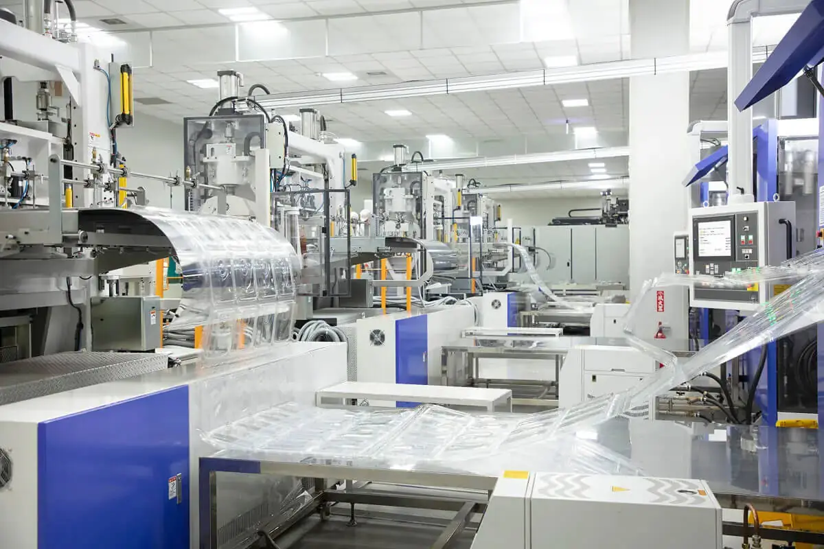 Sushi tray supplier South Plastic in-house thermoforming line in Taiwan producing clear plastic trays